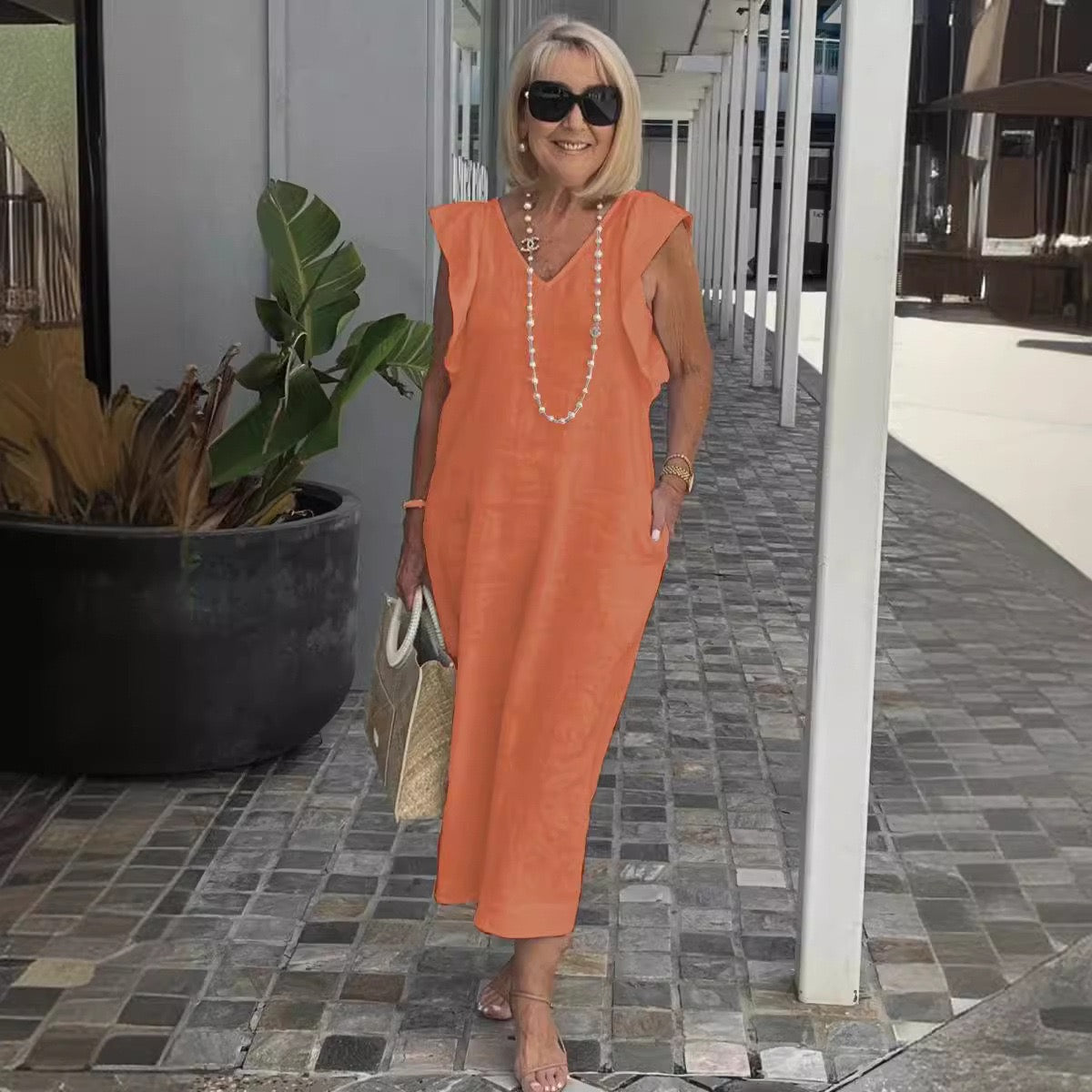 Elegant Flowing Sleeveless V-Neck Maxi Dress