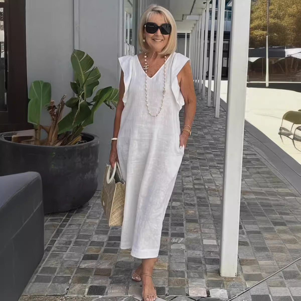 Elegant Flowing Sleeveless V-Neck Maxi Dress