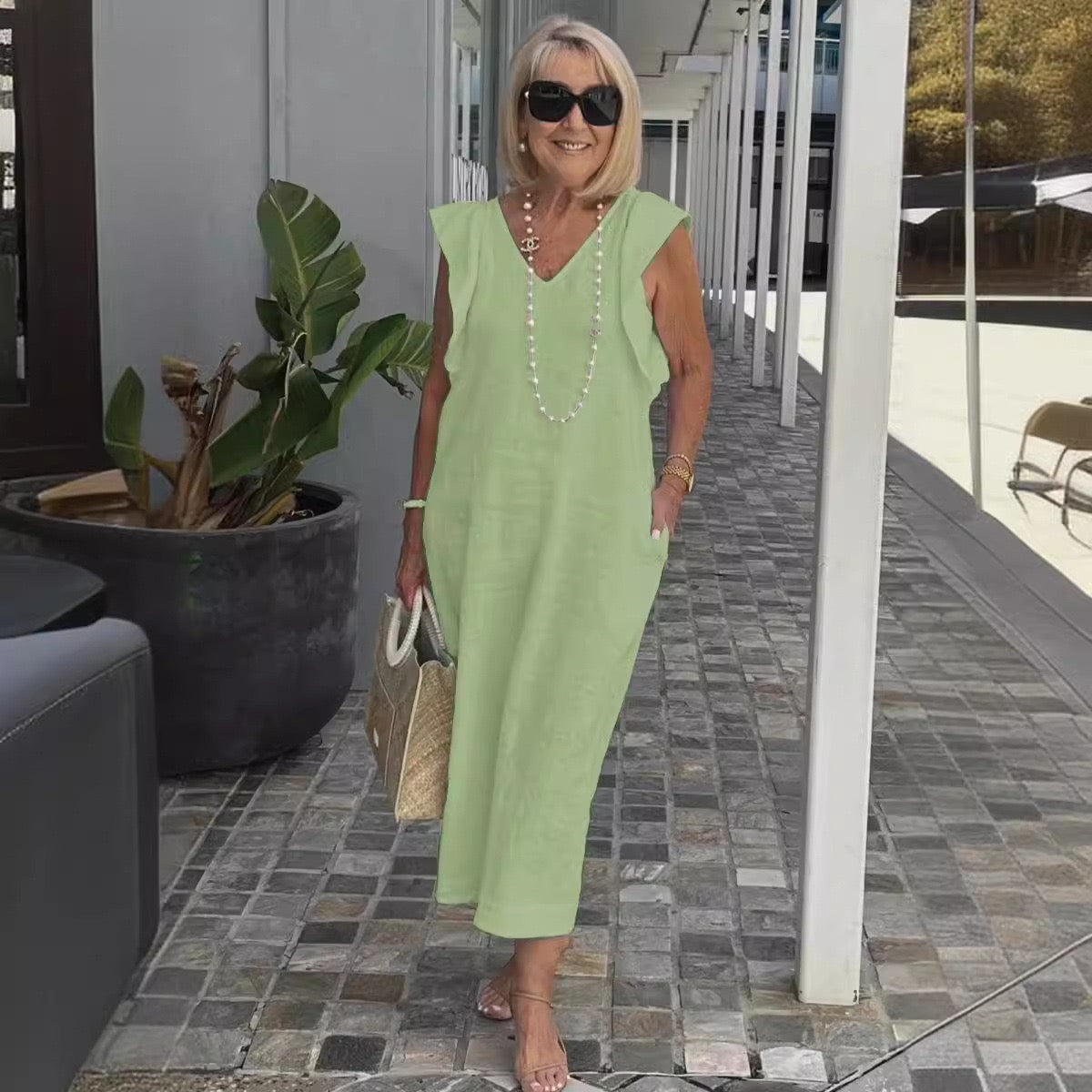 Elegant Flowing Sleeveless V-Neck Maxi Dress